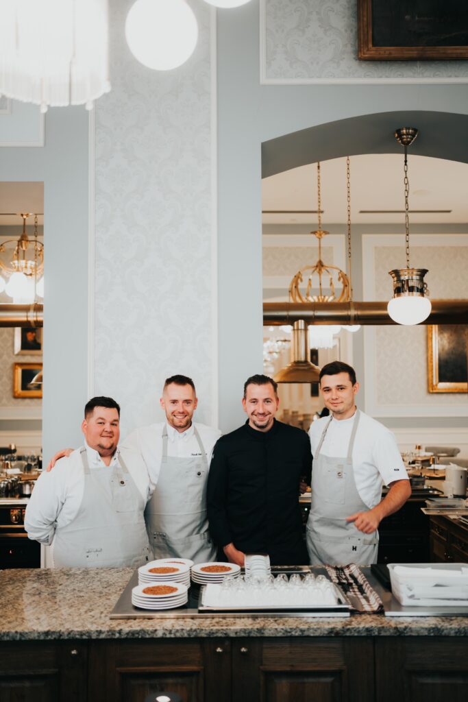 Four chefs in the restaurant.